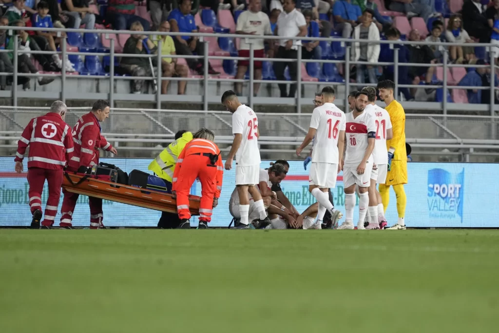 Turkey's Euro 2024 Campaign Takes a Hit as Defender Ozan Kabak Suffers Knee Injuryillustration