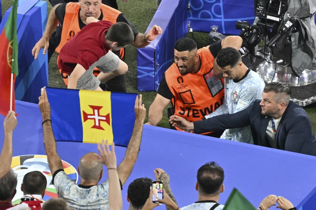 Euro 2024: Cristiano Ronaldo Narrowly Escapes Fan Incidentillustration